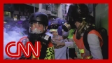 CNN reporter and crew hit by tear gas in Hong Kong
